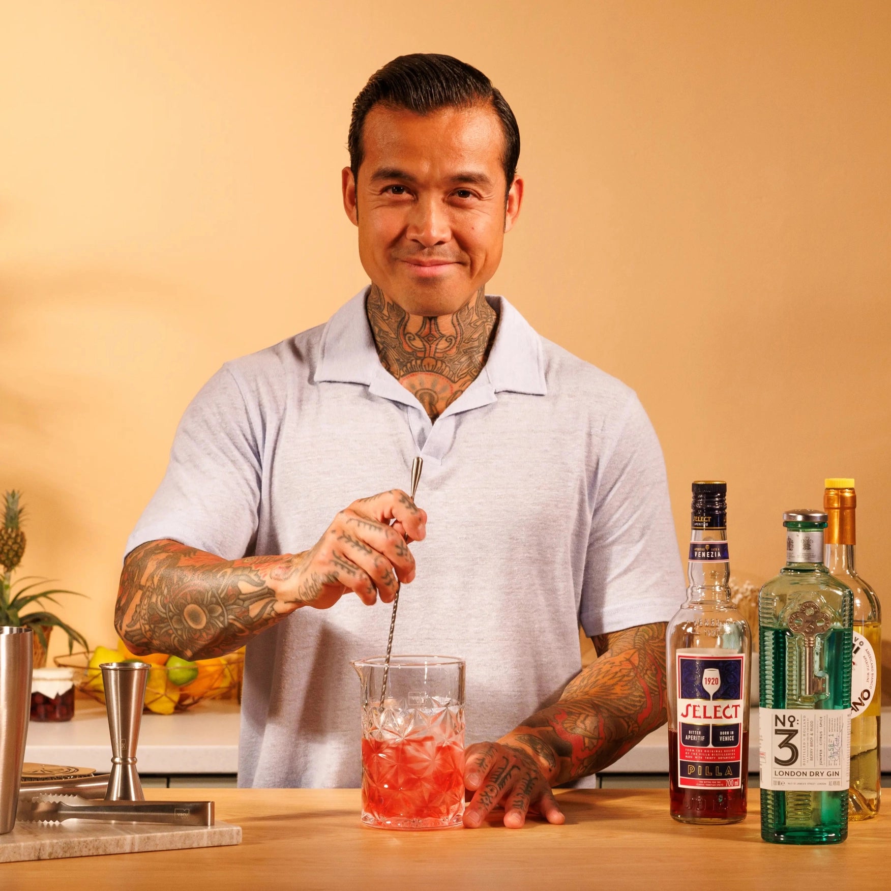 Stir and strain the Yuzu negroni cocktail